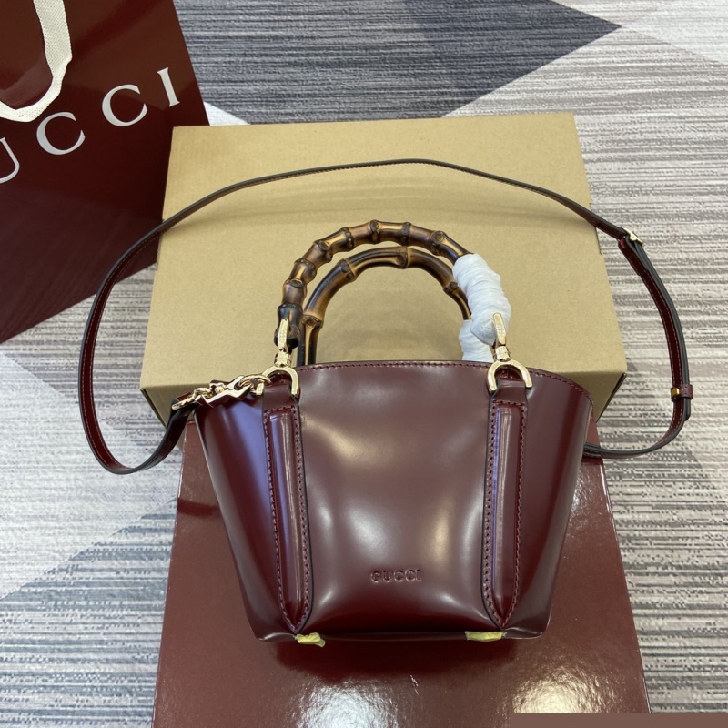 G*u*i top handle bags